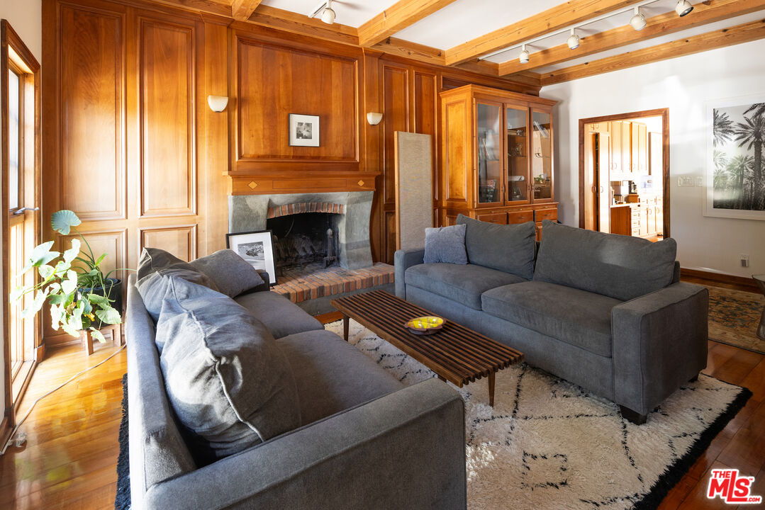 200 Mabery Road Santa Monica, CA 90402 - Photo 2 of 18 a living room with furniture and a fireplace