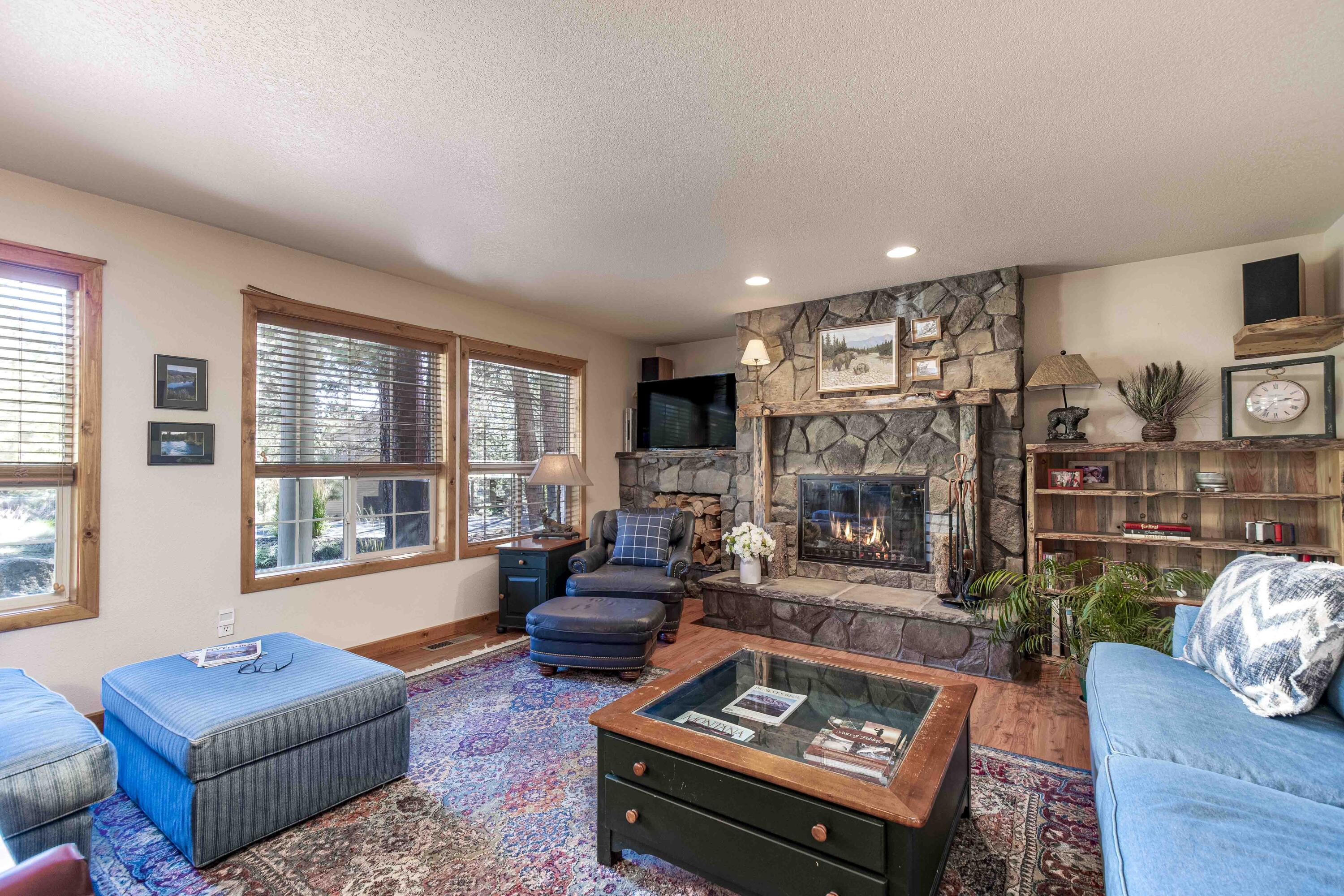 17912 Rhododendron Lane Sunriver, OR 97707 - Photo 20 of 35 The lower level boasts a spacious lodge-style family room which includes a closet and French doors which could allow it to be a separate suite as a bedroom and full bath are part of this area.