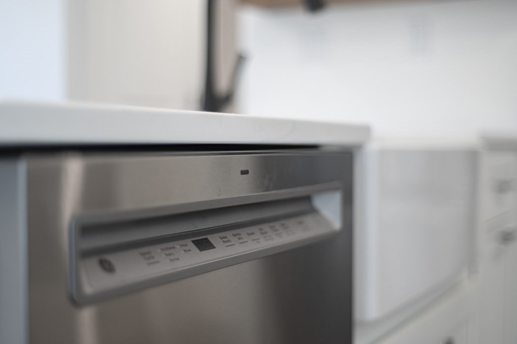 43 Needham Road, Unit 2 Danvers, MA 01923 - Photo 14 of 42 a close up view of washer