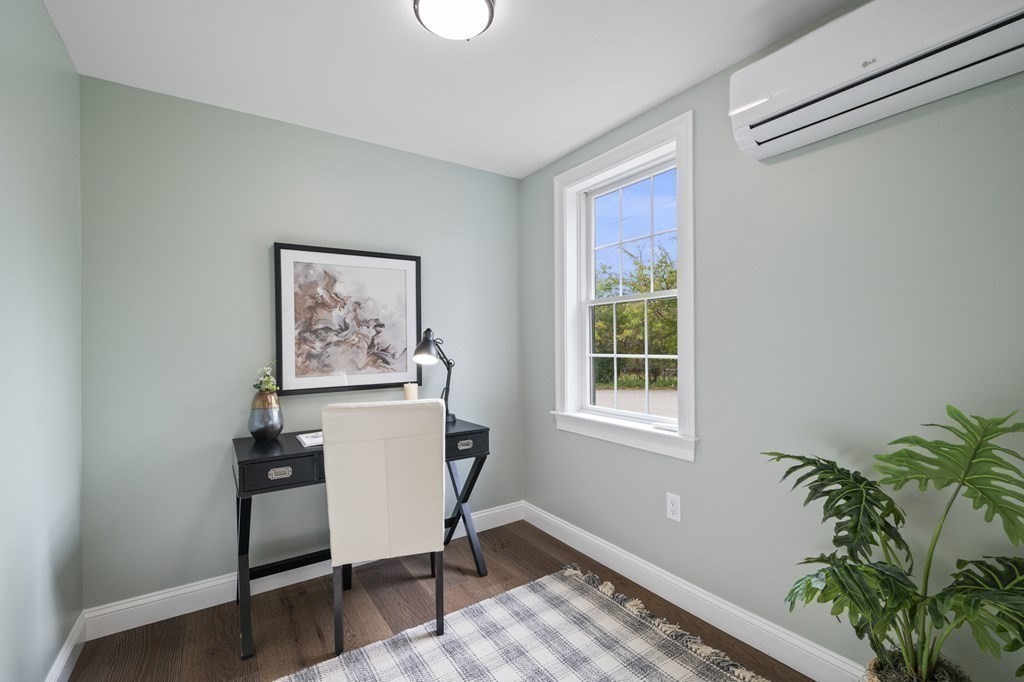 43 Needham Road, Unit 2 Danvers, MA 01923 - Photo 20 of 42 a view of a workspace with furniture and a window