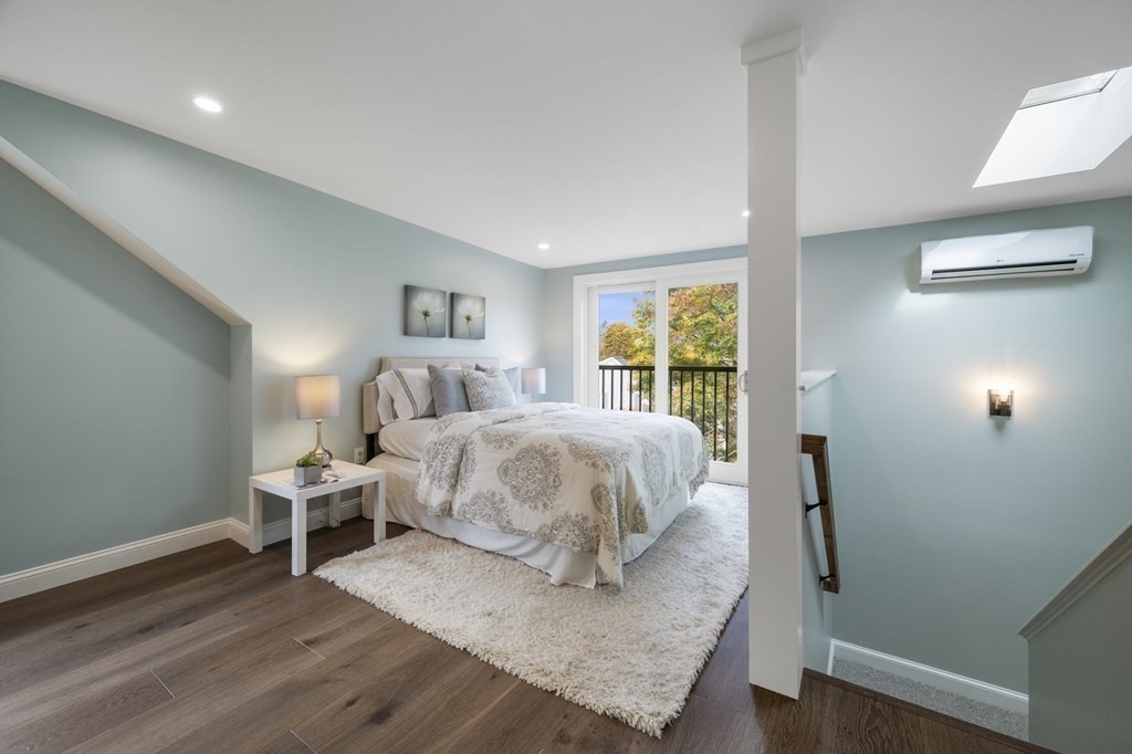 43 Needham Road, Unit 2 Danvers, MA 01923 - Photo 31 of 42 a bed room with a bed and a window