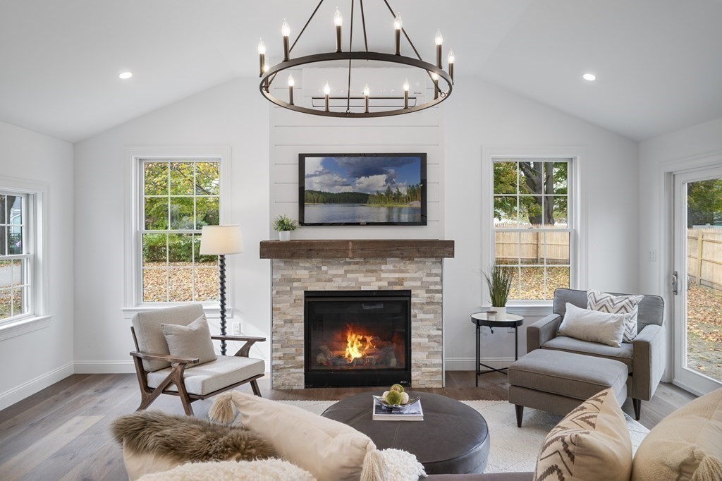 43 Needham Road, Unit 2 Danvers, MA 01923 - Photo 4 of 42 a living room with furniture a window and a fireplace
