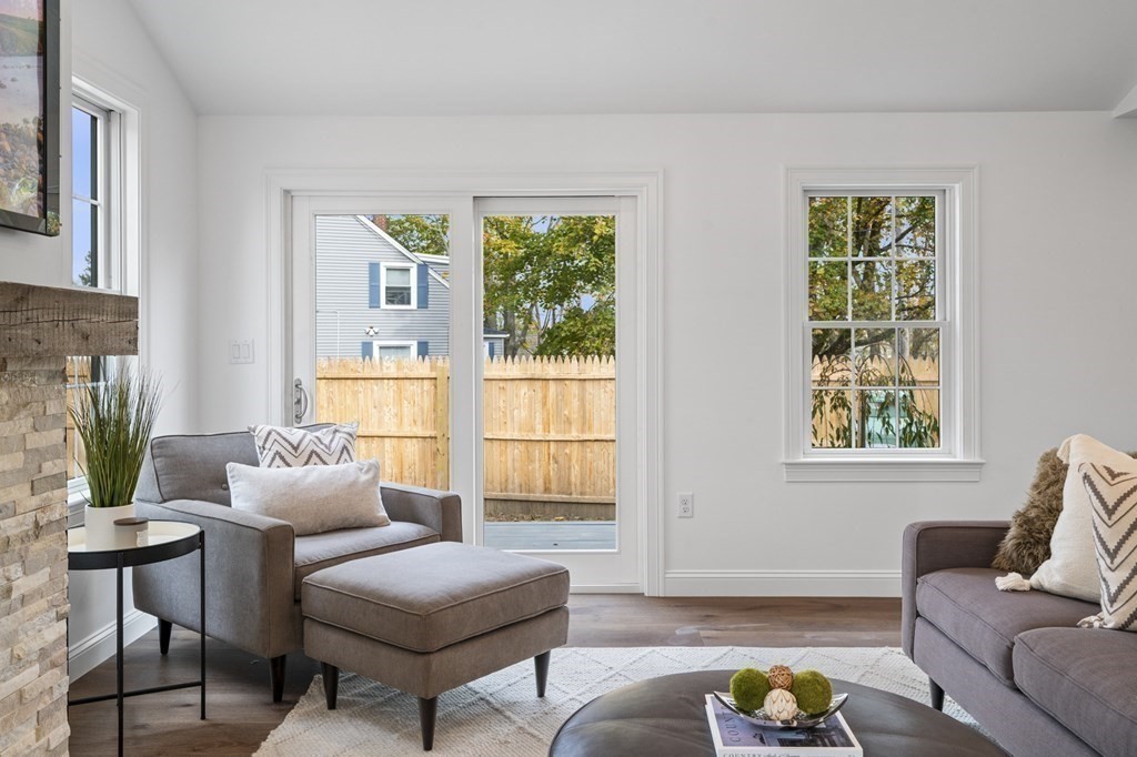 43 Needham Road, Unit 2 Danvers, MA 01923 - Photo 7 of 42 a living room with furniture and a window