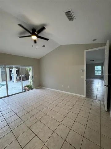a view of an empty room and window