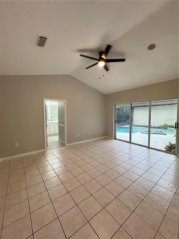 a spacious bathroom with a shower and a sink