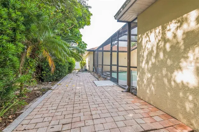 a house with swimming pool in front of it