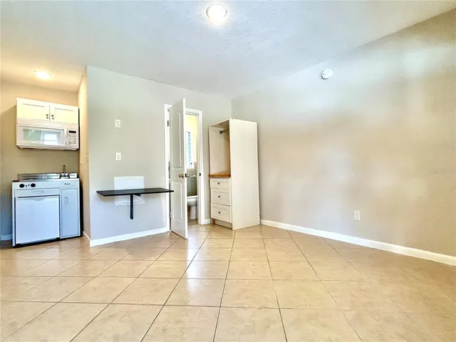 a view of a kitchen with a sink