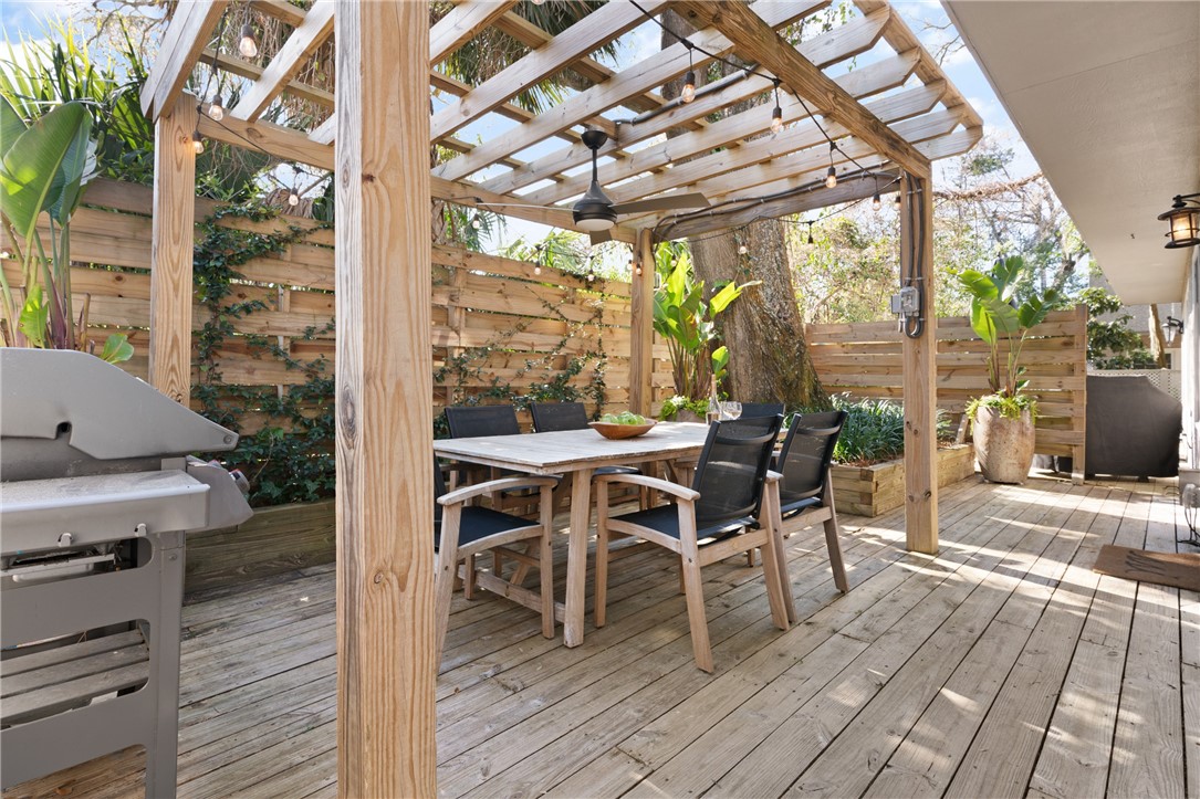 1460 Ocean Boulevard, Unit 108 St. Simons Island, GA 31522 - Photo 19 of 36 private back deck area with pergola