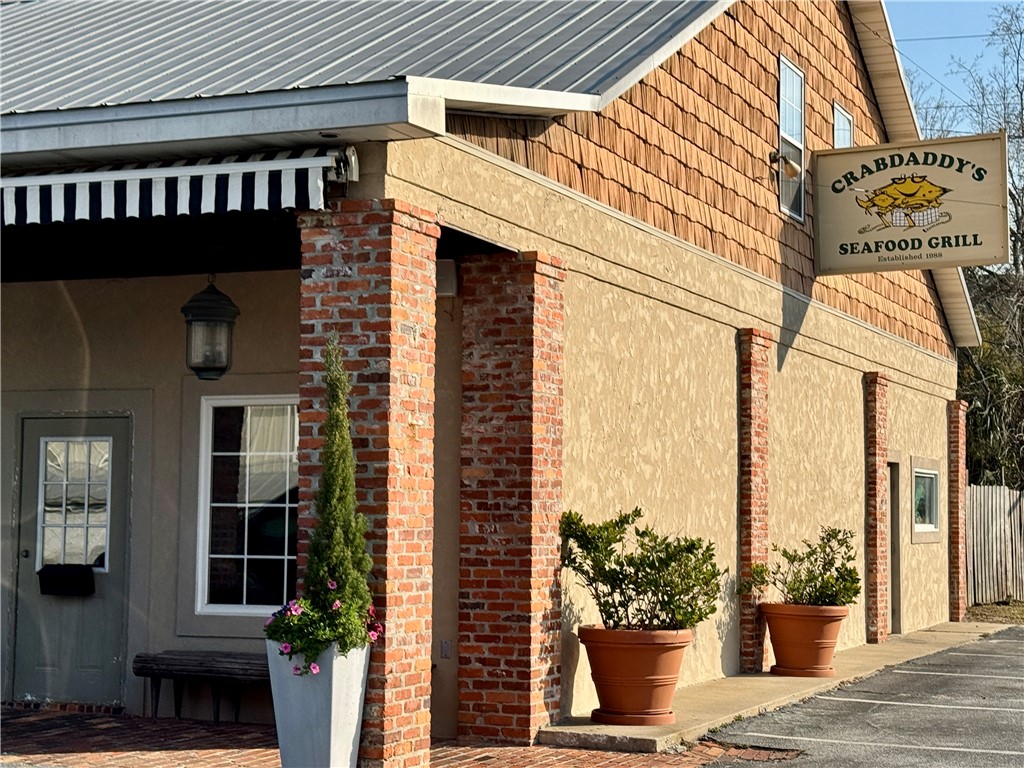 1460 Ocean Boulevard, Unit 108 St. Simons Island, GA 31522 - Photo 33 of 36 Short stroll to fabulous shops, yoga, restaurants, bike rentals, and more!