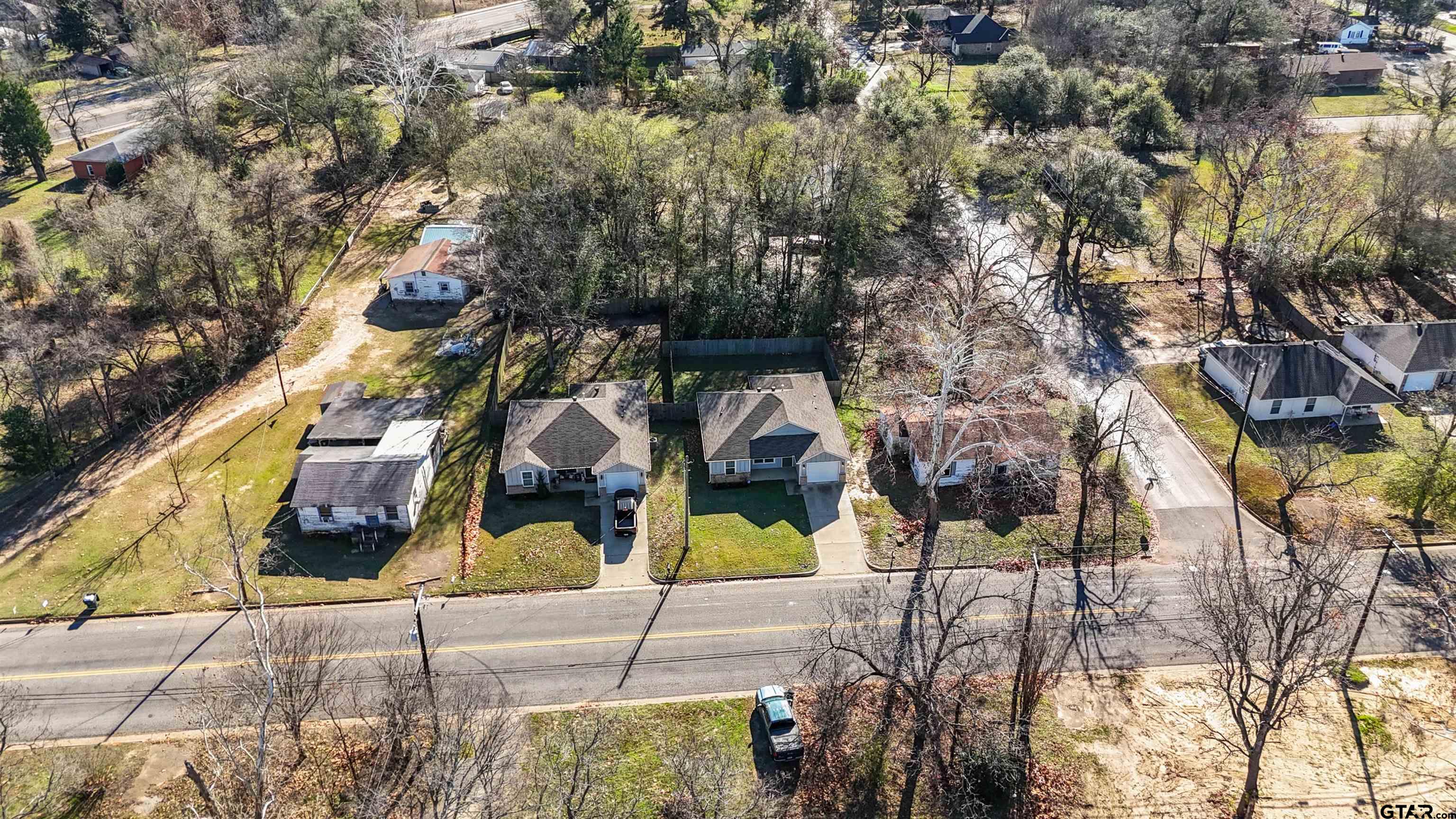2220 Walton Road Tyler, TX 75701 - Photo 6 of 29 a view of a park with plants and a bench