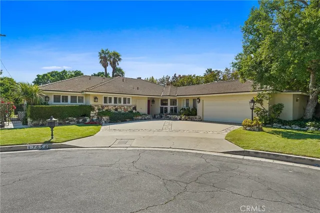 a view of house with outdoor space and street view