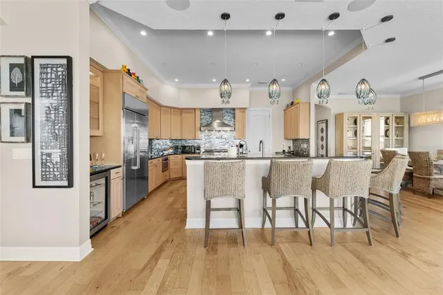a stove top oven sitting inside of a kitchen
