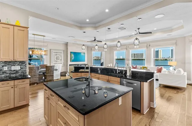 a view of a livingroom with furniture and a window