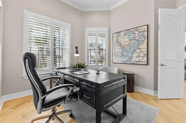 a bathroom with a toilet a sink and a mirror