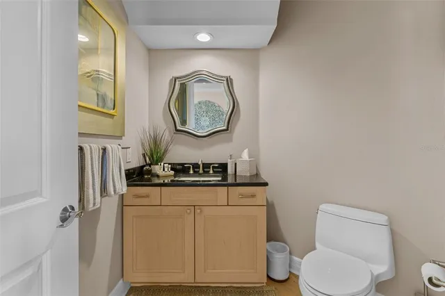 a bed room with furniture and a flat screen tv