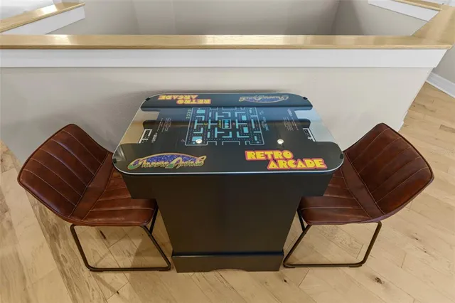 a bathroom with a granite countertop tub sink and mirror