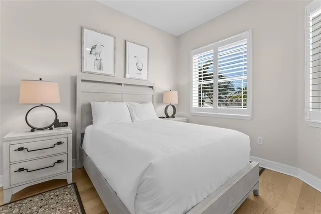 a bedroom with bed and a couch