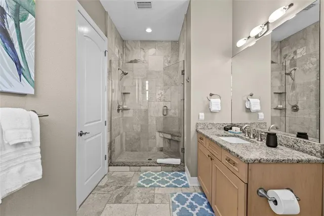 a view of house with swimming pool yard and outdoor seating