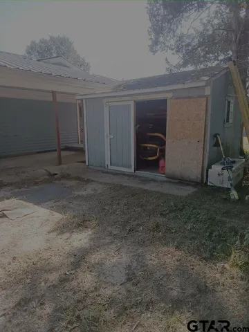 a view of a room with an empty space