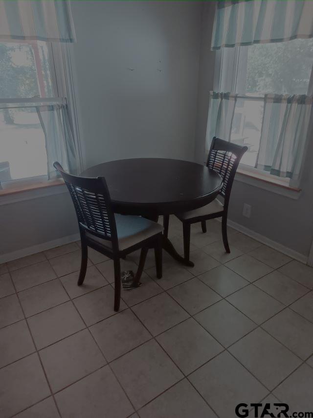 584 County Road 302 Carthage, TX 75633 - Photo 6 of 27 a view of a room with furniture and wooden floor