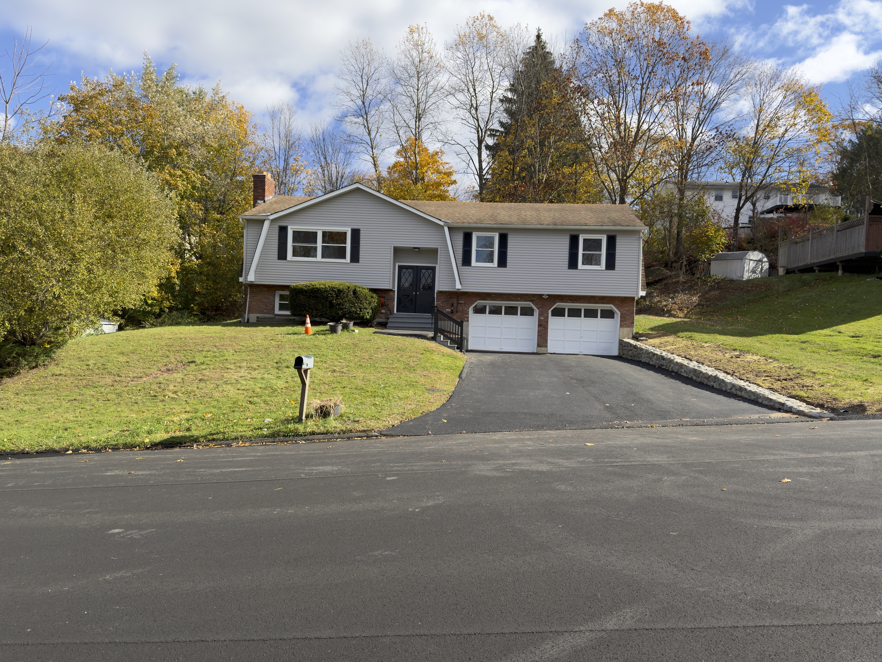 63 Haddad Road Waterbury, CT 06708 - Photo 13 of 30 a view of house with a yard