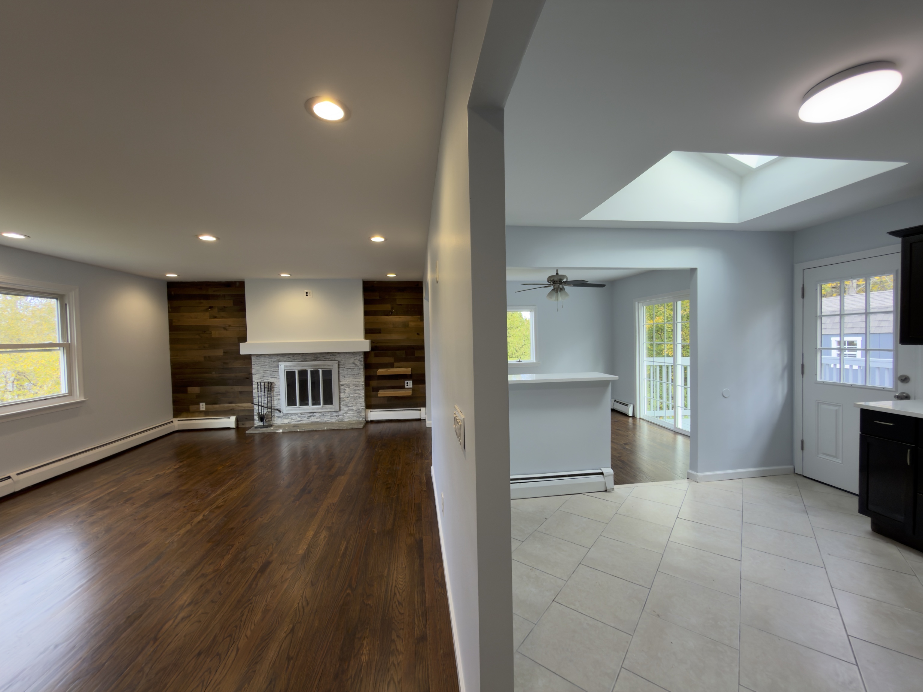 63 Haddad Road Waterbury, CT 06708 - Photo 20 of 30 an empty room with wooden floor and windows