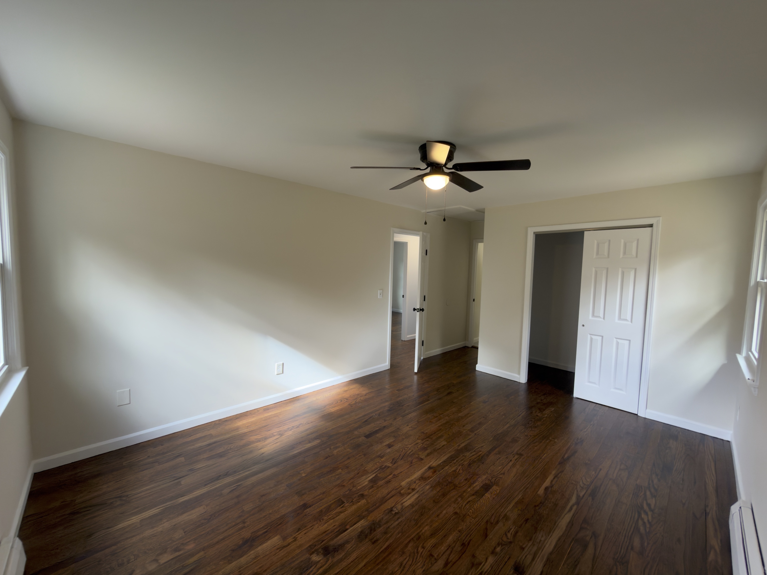 63 Haddad Road Waterbury, CT 06708 - Photo 25 of 30 a view of an empty room with wooden floor