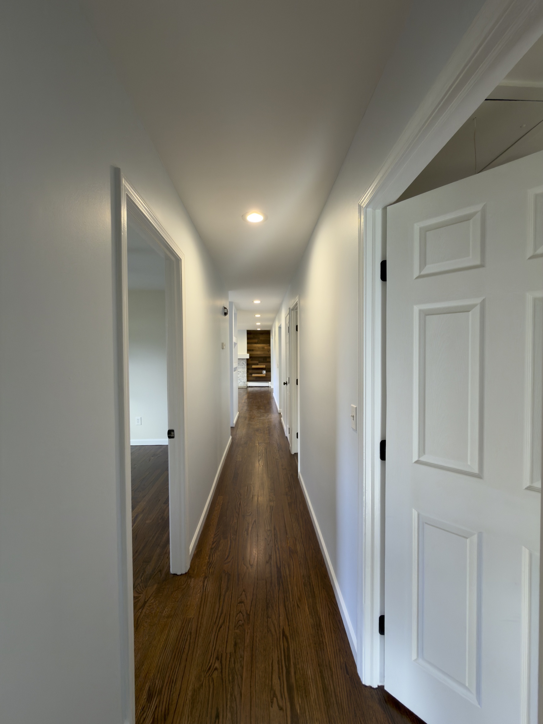 63 Haddad Road Waterbury, CT 06708 - Photo 29 of 30 a view of hallway with wooden floor