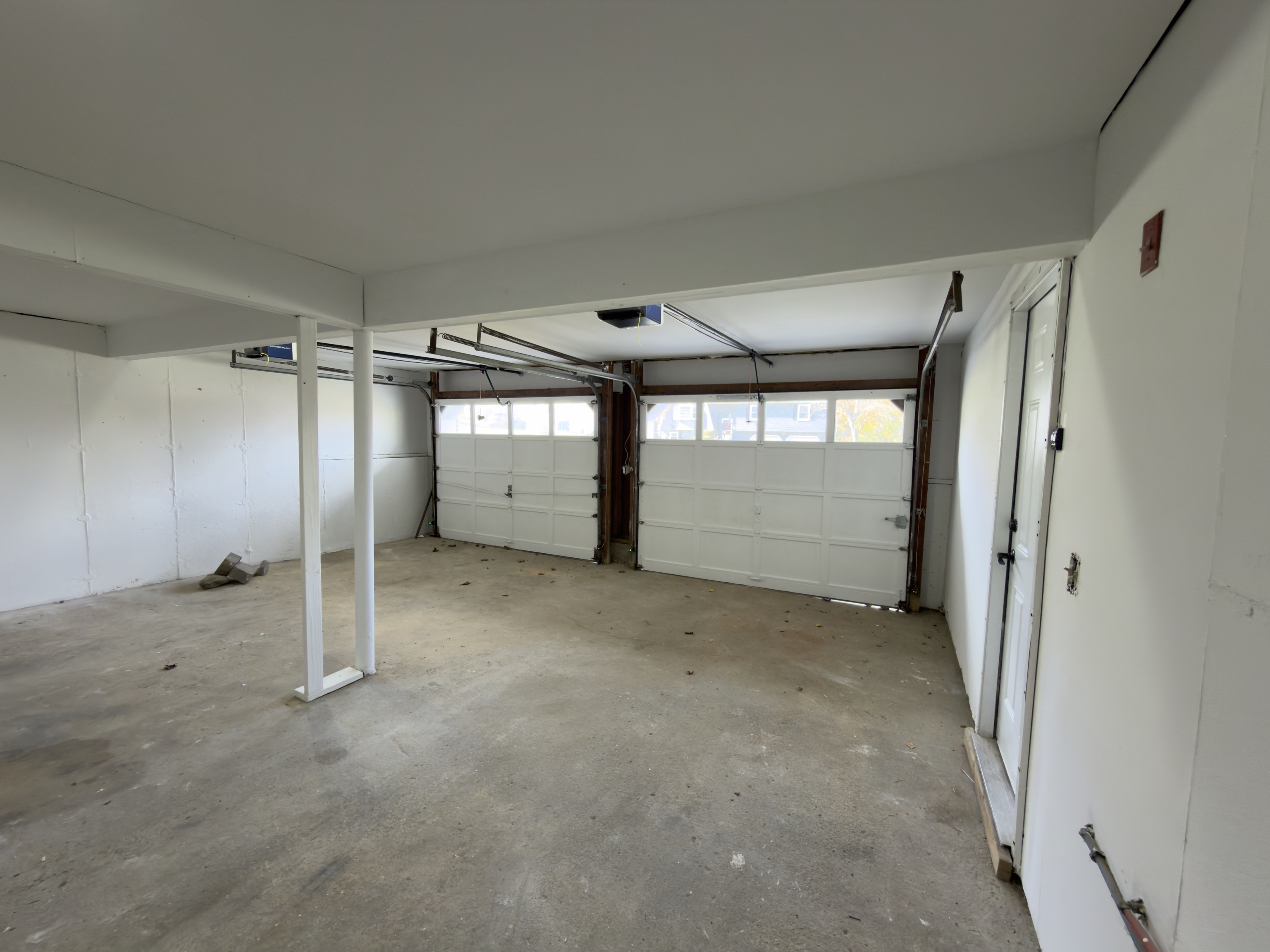 63 Haddad Road Waterbury, CT 06708 - Photo 9 of 30 an empty room with a empty space and windows