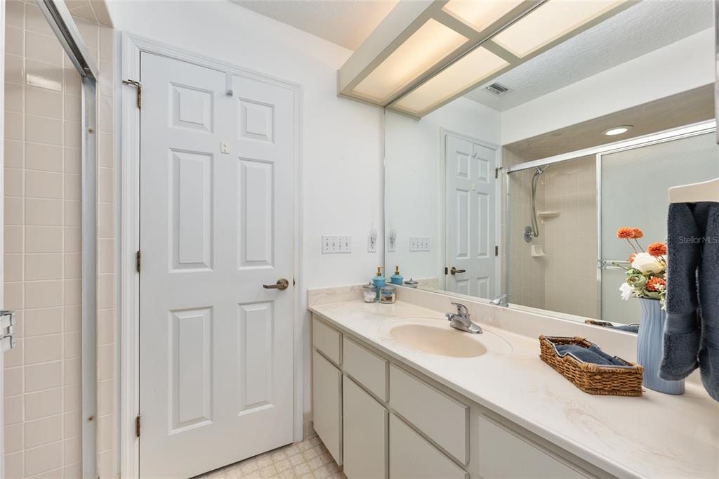 8038 Southwest 108th Loop Ocala, FL 34481 - Photo 25 of 48 a bathroom with a sink and a mirror