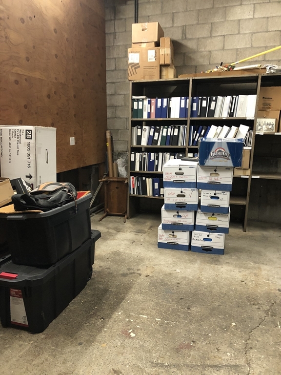 270-272 Sidney Street Cambridge, MA 02139 - Photo 12 of 24 a living room with furniture