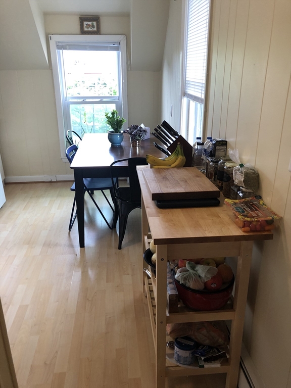 270-272 Sidney Street Cambridge, MA 02139 - Photo 18 of 24 a view of a workspace with furniture and window