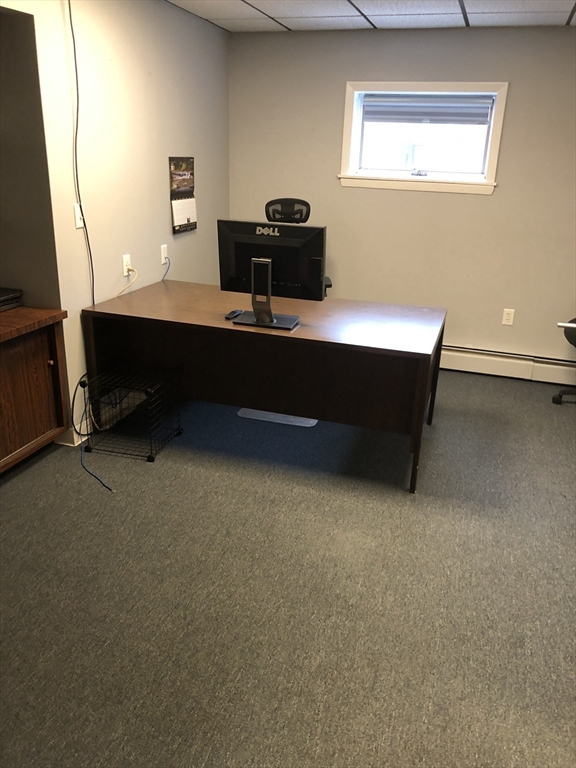 270-272 Sidney Street Cambridge, MA 02139 - Photo 5 of 24 a room with a table and a window