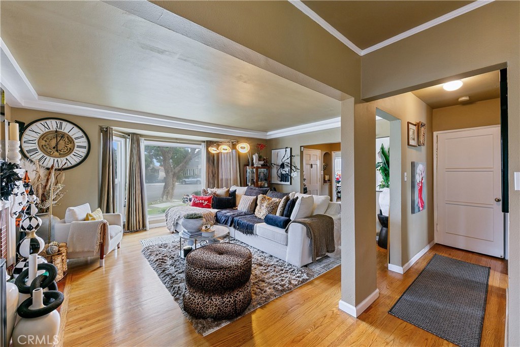 3907 Edgehill Drive Leimert Park, CA 90008 - Photo 14 of 38 a living room with furniture and a large window