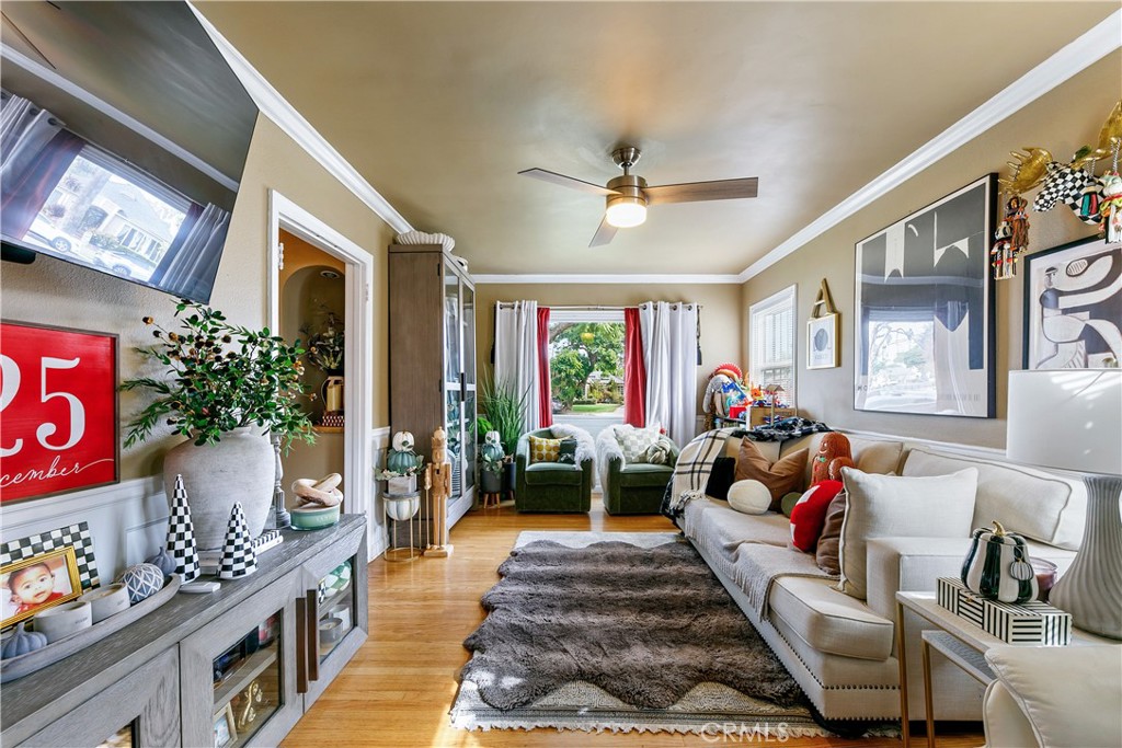 3907 Edgehill Drive Leimert Park, CA 90008 - Photo 16 of 38 a living room with furniture chess board and a fireplace