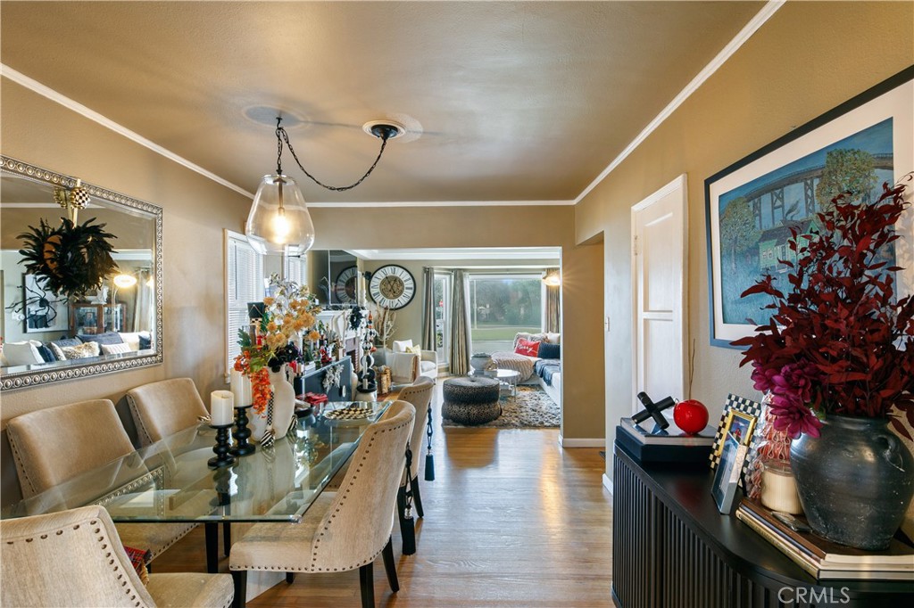 3907 Edgehill Drive Leimert Park, CA 90008 - Photo 10 of 38 a view of a dining room with furniture and wooden floor