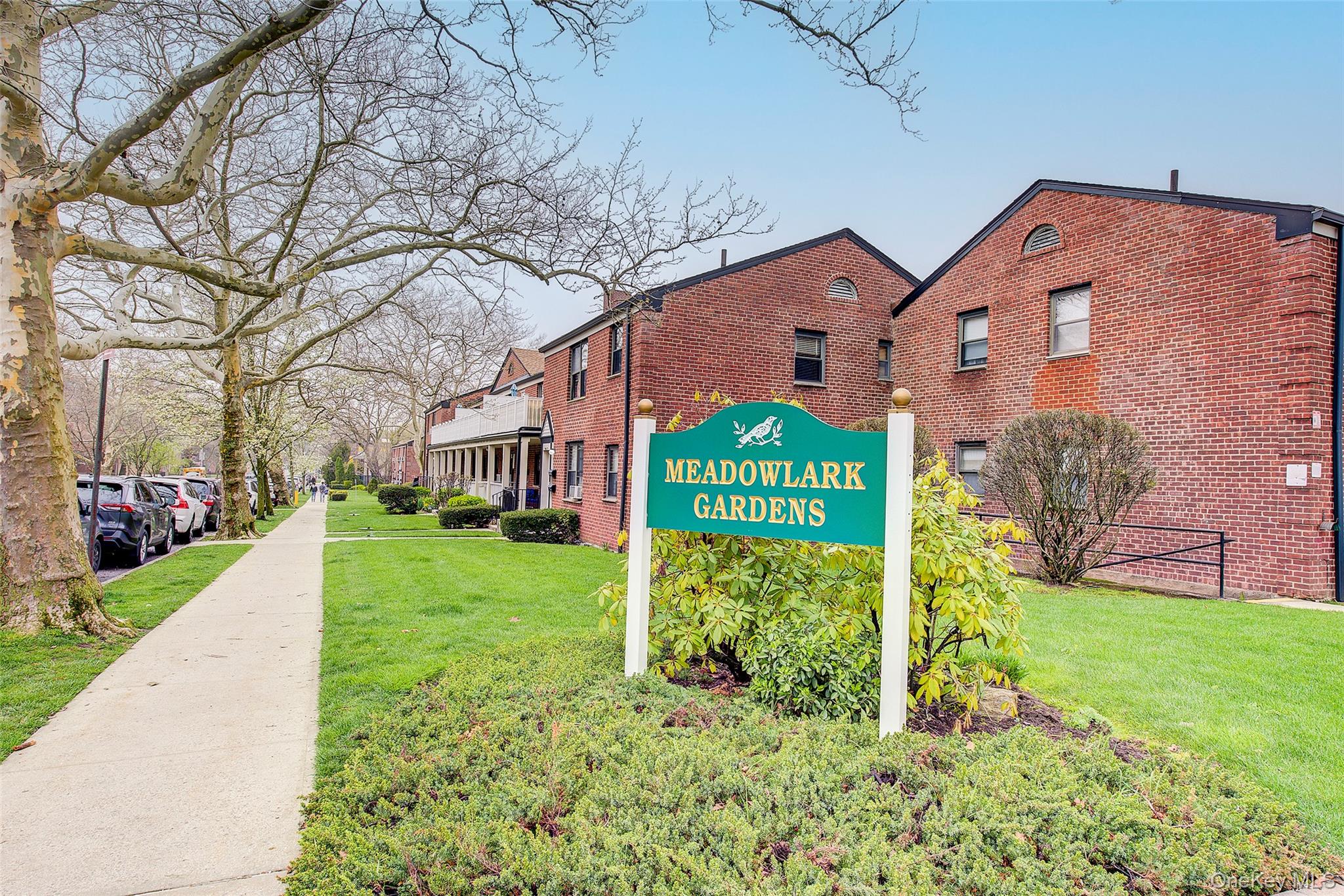 196-57 69th Avenue, Unit 1 Queens, NY 11365 - Photo 17 of 18 a sign on the side of a building