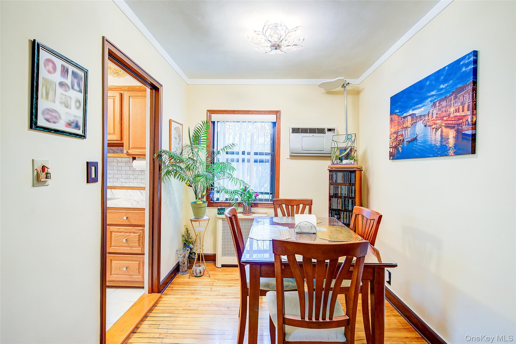 196-57 69th Avenue, Unit 1 Queens, NY 11365 - Photo 7 of 18 a view of a dining room with furniture window and wooden floor
