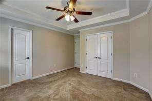 802 Pathview Court Dacula, GA 30019 - Photo 40 of 56 a view of an empty room and chandelier fan