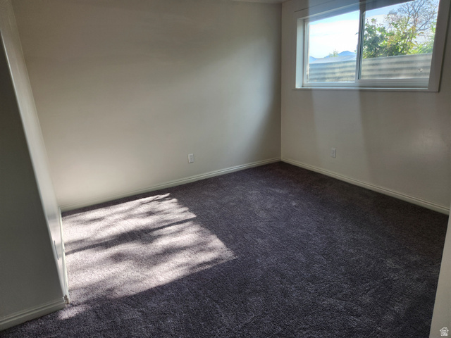 705 North 700 East Payson, UT 84651 - Photo 30 of 30 Carpeted spare room featuring baseboards