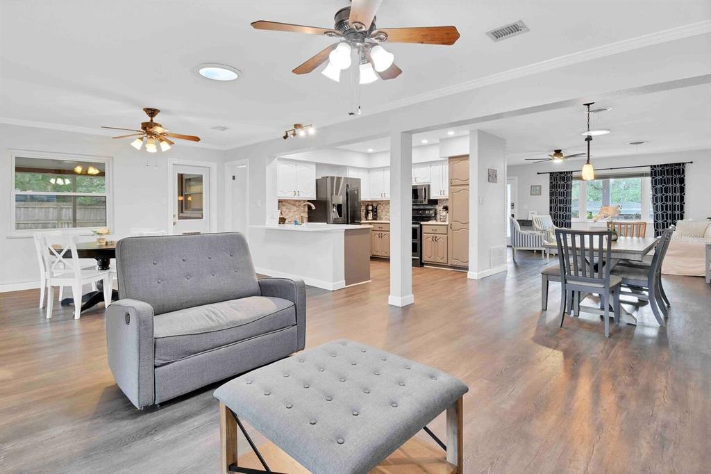 863 Bay Breeze Terrace Largo, FL 33770 - Photo 14 of 19 a living room with furniture and wooden floor