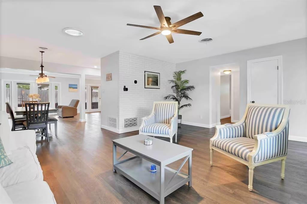 863 Bay Breeze Terrace Largo, FL 33770 - Photo 16 of 19 a living room with furniture and wooden floor
