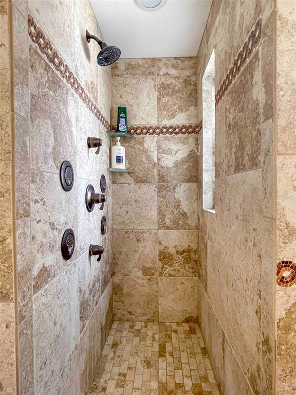 863 Bay Breeze Terrace Largo, FL 33770 - Photo 5 of 19 a bathroom with a shower