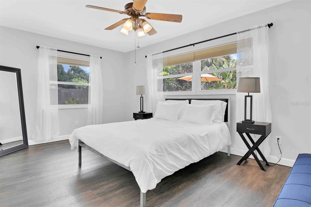 863 Bay Breeze Terrace Largo, FL 33770 - Photo 7 of 19 a bedroom with a bed and a window