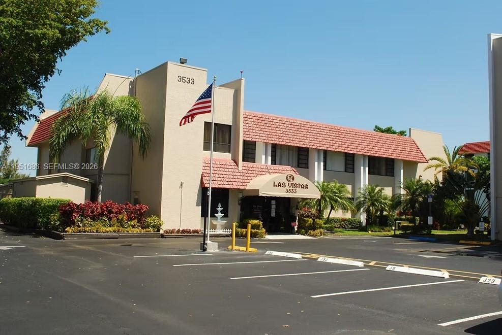 3531 Inverrary Drive, Unit 107 Lauderhill, FL 33319 - Photo 25 of 34 a front view of a building with street view
