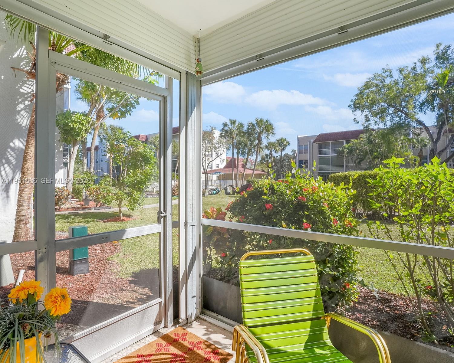 3531 Inverrary Drive, Unit 107 Lauderhill, FL 33319 - Photo 3 of 34 a view of a porch and a yard