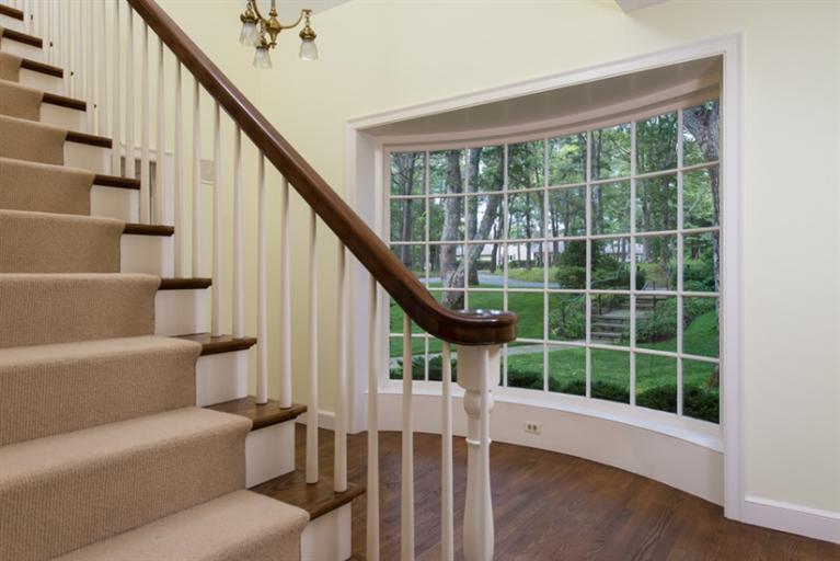 185 Ice Valley Road Osterville, MA 02655 - Photo 2 of 22 a view of entryway with wooden floor and windows