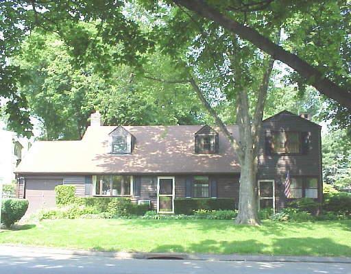 11 Cambridge Road Stamford, CT 06902 - Photo 1 of 1 a view of a house with a yard and plants