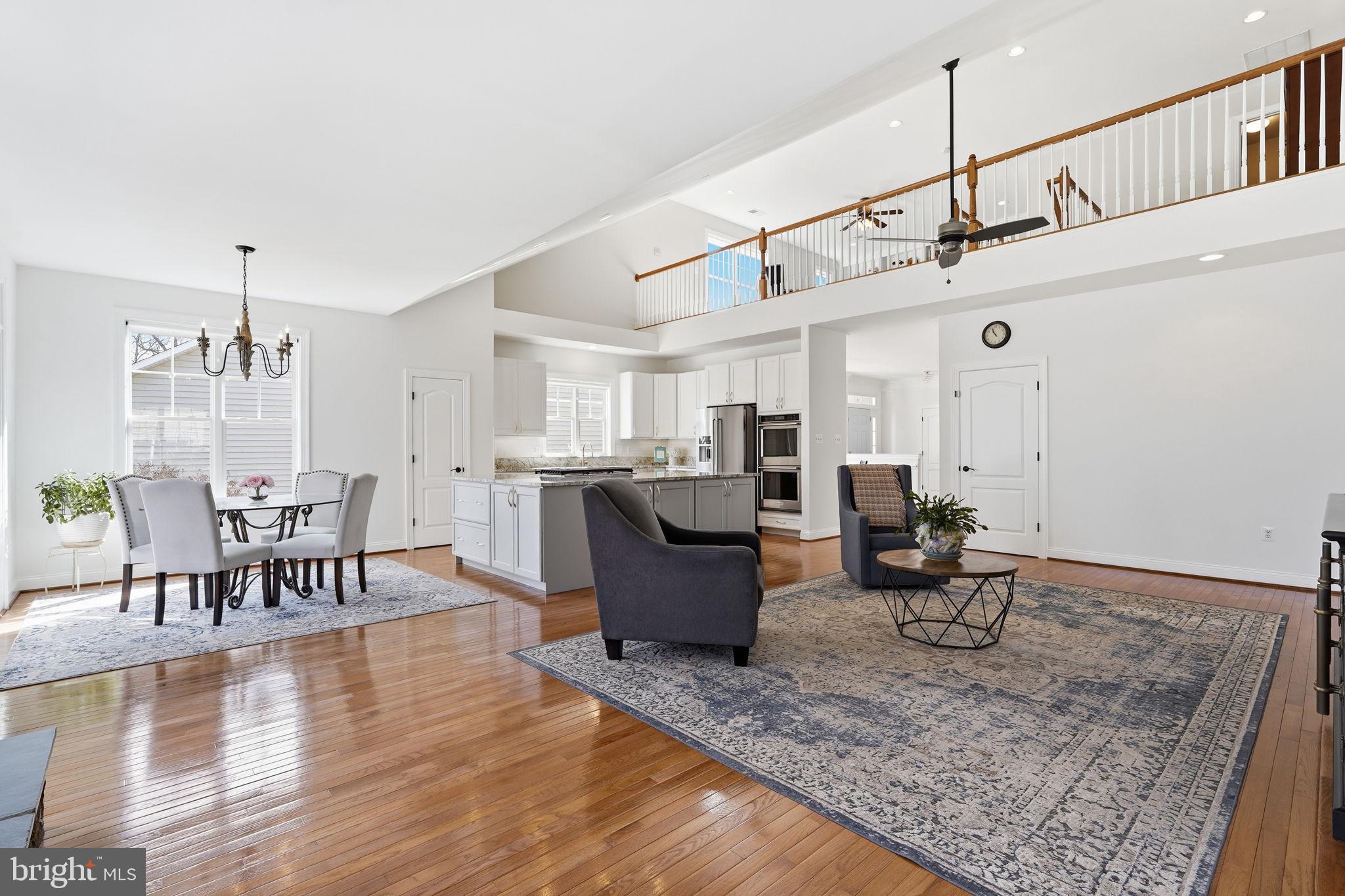 105 Turnstone Lane White Post, VA 22663 - Photo 76 of 77 a living room with furniture and a wooden floor