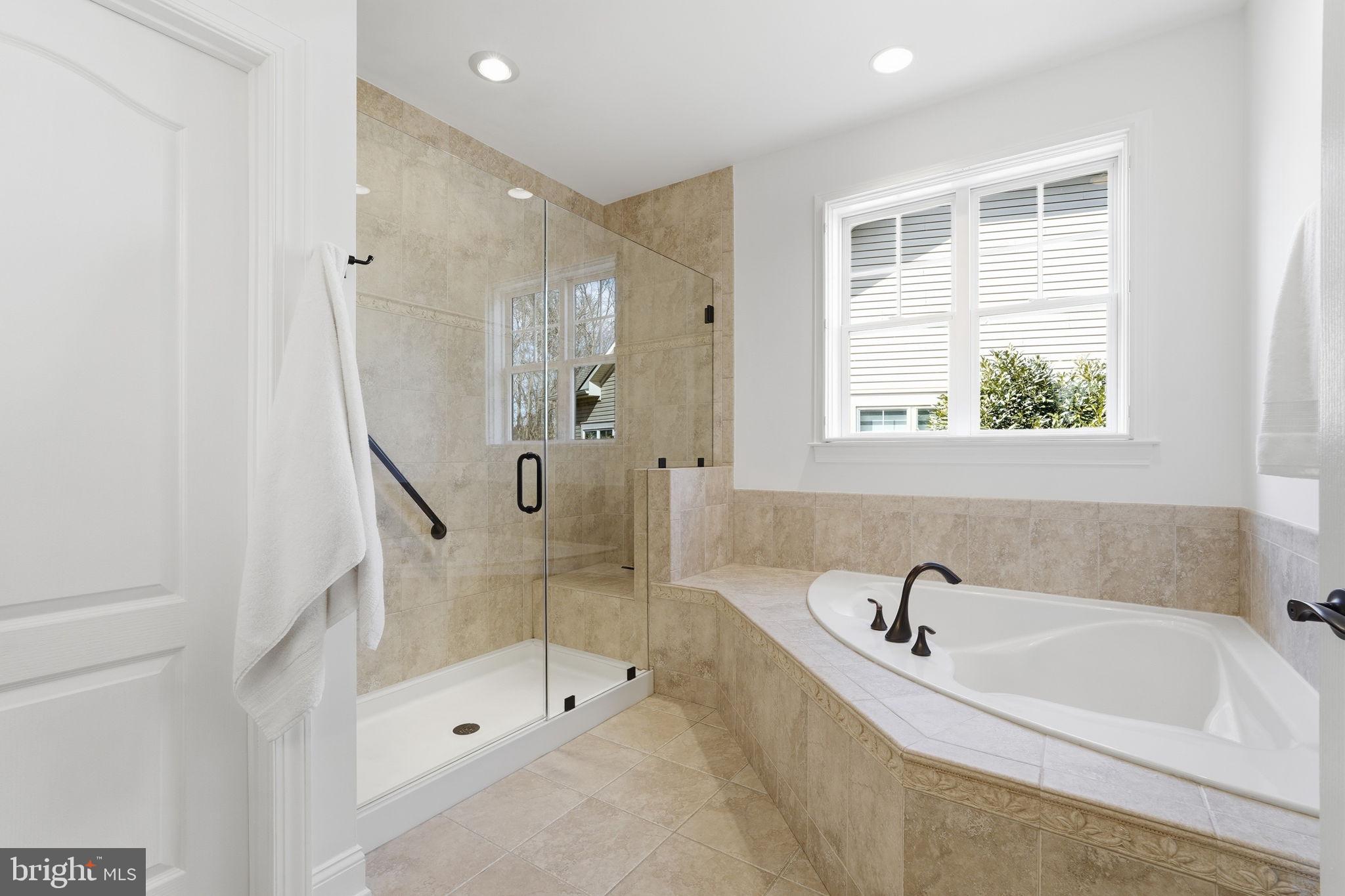 105 Turnstone Lane White Post, VA 22663 - Photo 21 of 77 a white bath tub sitting next to a shower